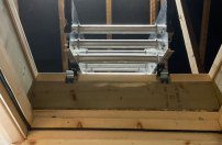 Loft ladder in the stowed position