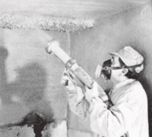 asbestos being applied by worker