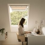 top hung roof window with woman working
