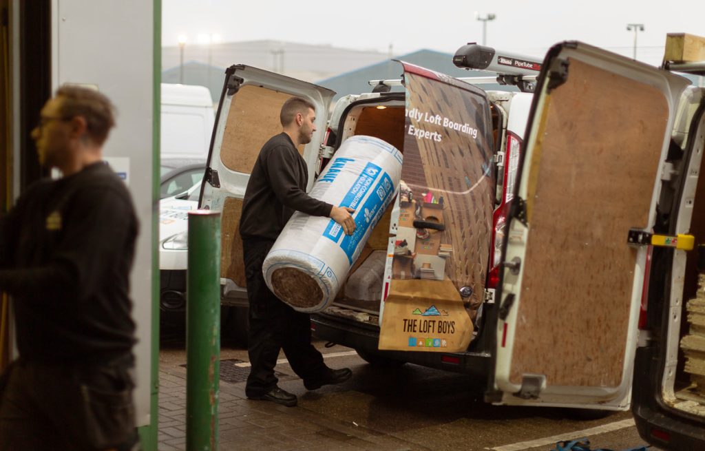 loading van with insulation rolls