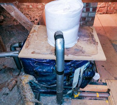 A boiler in the loft with ACM insulation