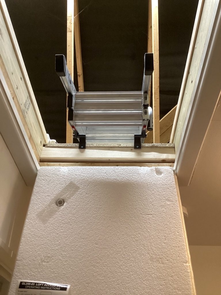 stowed ladder and foam insulated hatch